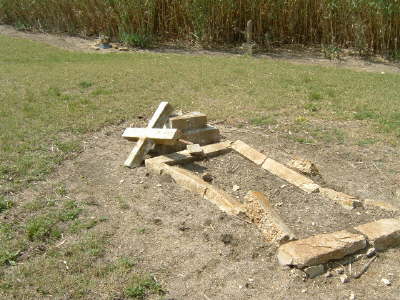 Fallen Cross with concrete lined blocks