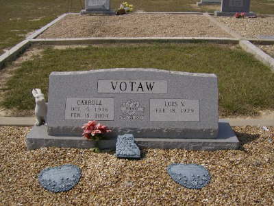 Votaw, Carroll & Louis V.